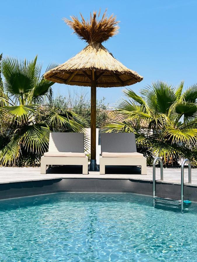 Cabane Le Flamant Avec Jardin, Piscine Et Parking แซ็งต์-มารี-เดอ-ลา-แมร์ ภายนอก รูปภาพ
